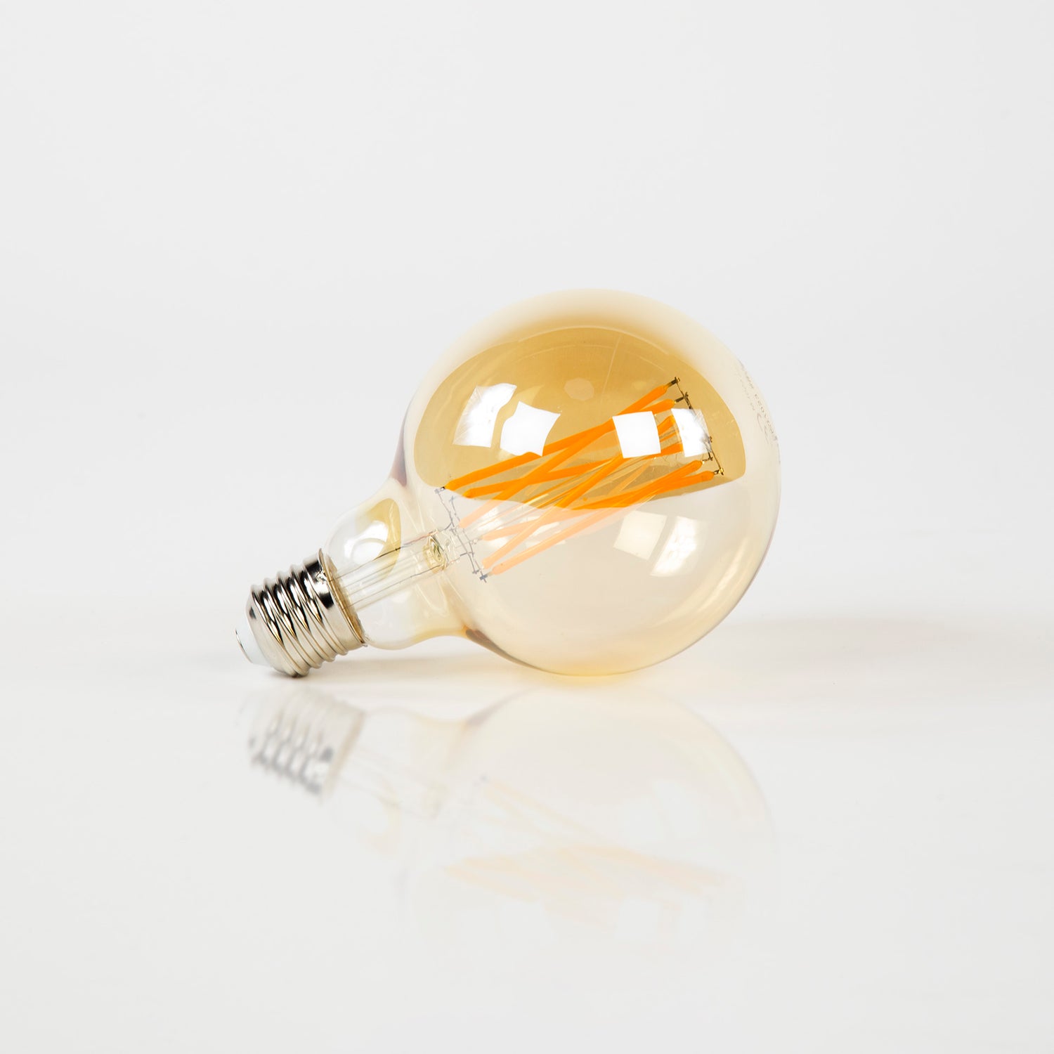 Lichtbron LED filament bol E27 - 9,5x9,5x14 cm - 6W Dimbaar - Amber - Glas