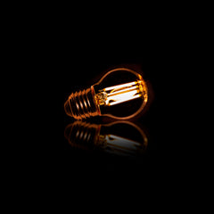 LED Lichtbron Filament Bol [G45] - E27 - 4W 2100K 280lm dimbaar - 4,5x4,5x7,5 cm - Amber - Glas