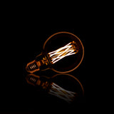 Lichtbron LED filament bol E27 - 9,5x9,5x14 cm - 6W Dimbaar - Amber - Glas